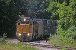 UP 1990 leads LTA-42 around the curve off the CP and onto the Winona Sub